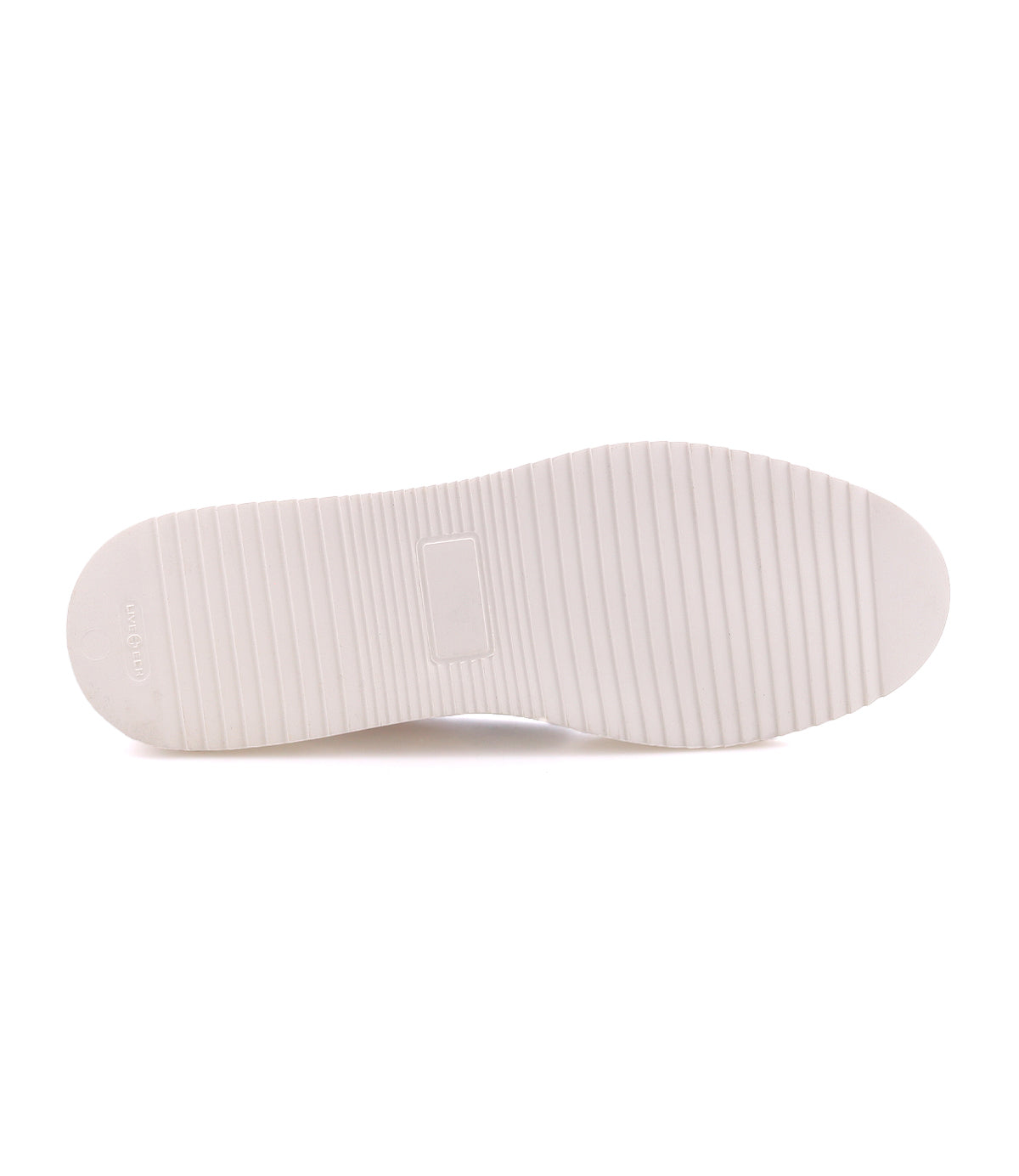 Off-white rubber sole of a Lynox sneaker featuring a textured, ridged tread pattern.