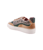 Bed|Stü Lynox low-top sneaker with tan and olive leather panels featuring floral laser-cut detailing, hand-stitched vine details, and a thick white rubber sole.
