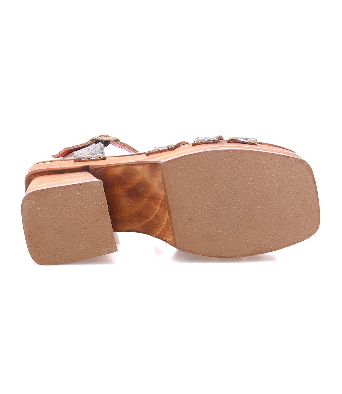 Bottom view of the Bed Stu Lyxon sandal, an open-toe wooden platform with a brown sole and heel, stud accents, and leather t-strap upper.