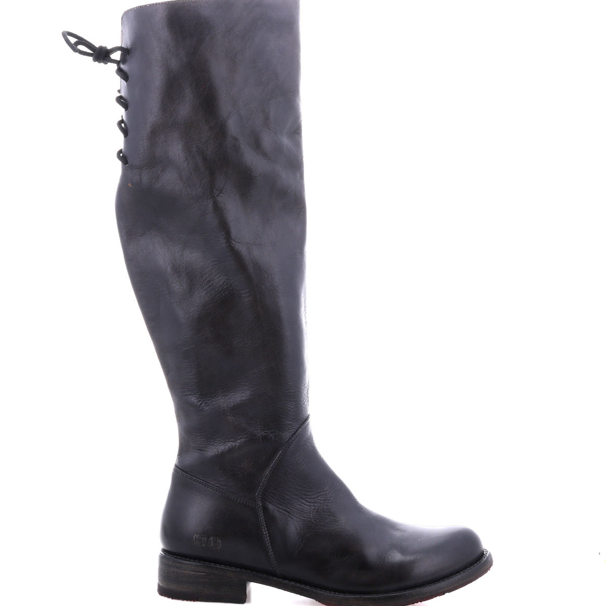 The Bed Stu Manchester is a tall black leather women's boot featuring a low heel, rounded toe, and lace-up detail at the upper back—an essential addition to any wardrobe.