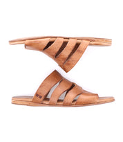 The Bed Stu Margin features brown leather slide sandals with a leather upper and multiple straps, displayed side by side against a white background—ideal for casual outings.