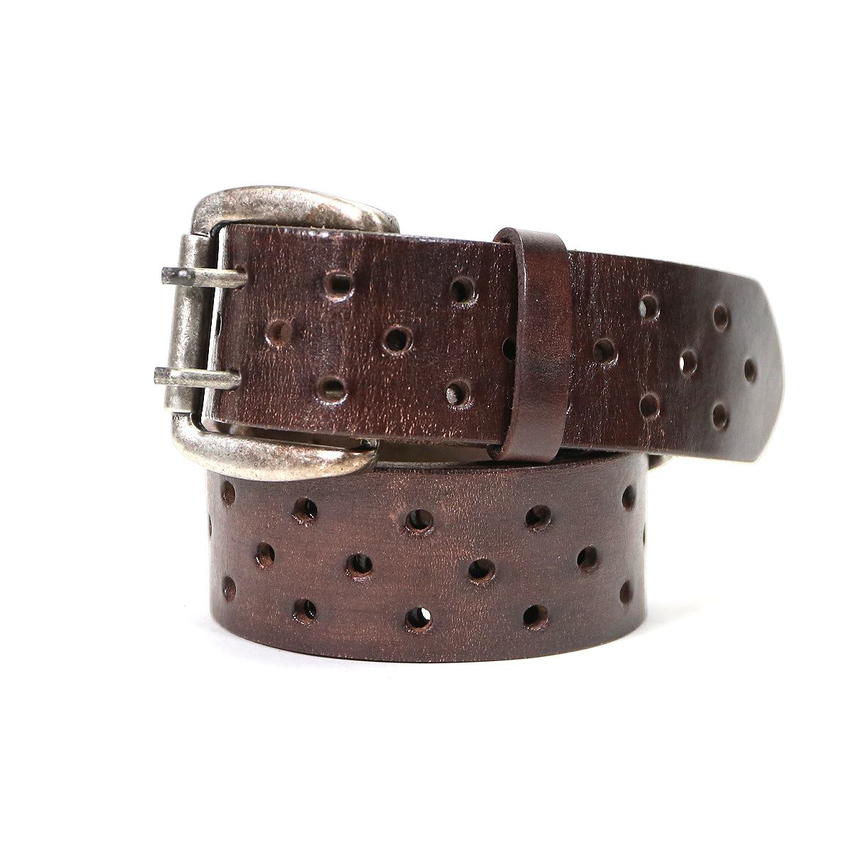 A brown Bed Stu vegetable-tanned leather belt with a silver buckle and multiple holes throughout, coiled loosely, isolated on a white background.