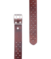 The Bed Stu Mccoy is a brown vegetable-tanned leather belt featuring a silver-tone buckle and evenly spaced metal studs, blending classic style with modern details. Shown flat on a white background.