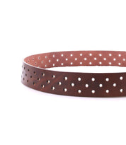 The Bed Stu Mccoy is a brown vegetable-tanned leather belt with evenly spaced round holes, offering a timeless design and displayed against a white background.