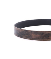 A close-up of the Bed Stu Meander belt in brown distressed leather with a black inner lining and antique metal buckle, shown on a white background.
