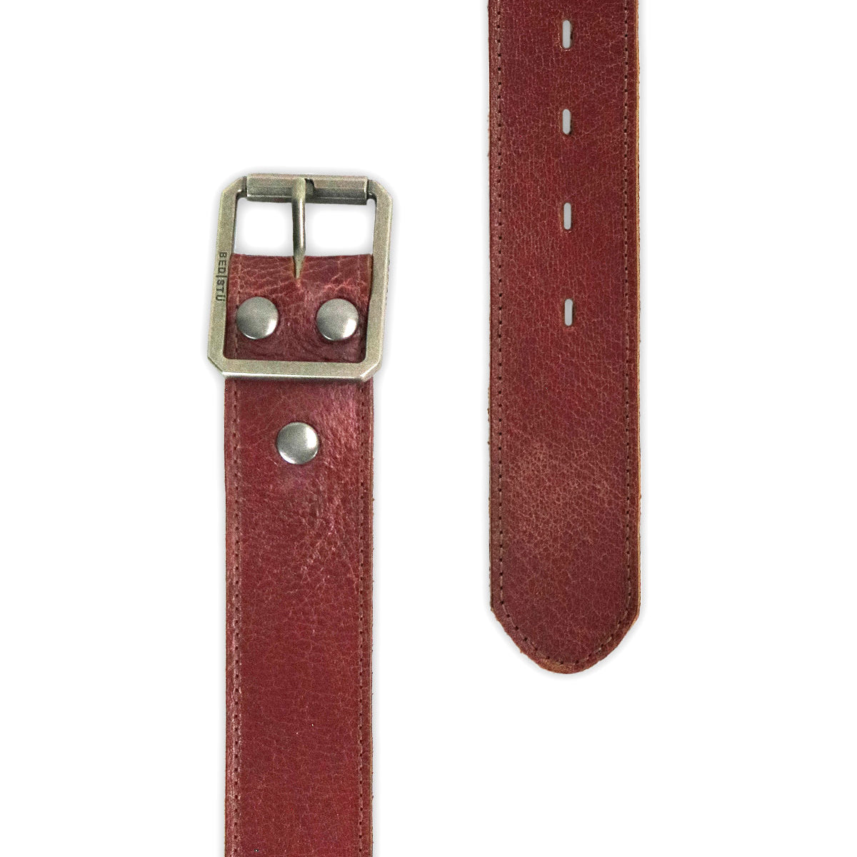 The Bed Stu Meander is a versatile red leather belt with a silver rectangular buckle and metal rivets, showing the buckle end and pointed tip side by side.