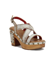 A comfortable Bed Stu Mediation sandal with a wooden platform and studded straps.