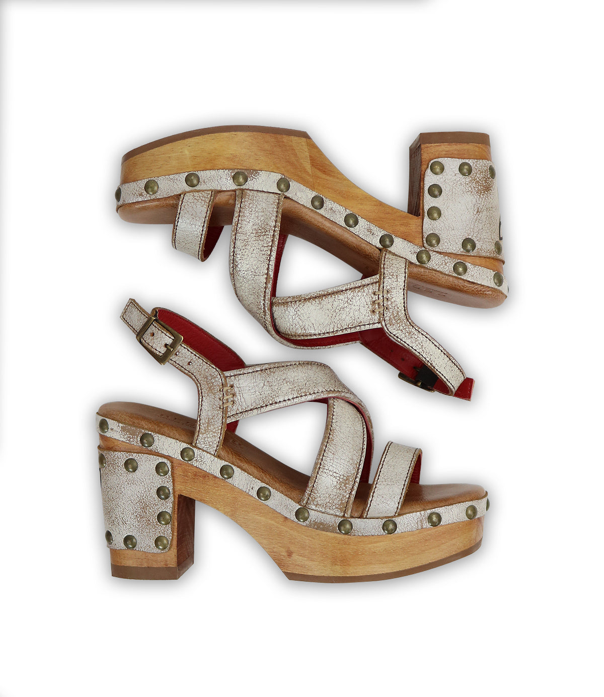 A pair of comfortable white Mediation sandals with studs by Bed Stu.