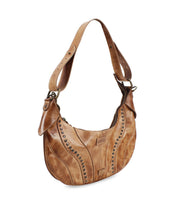 The Megara by Bed Stu is a brown leather shoulder bag adorned with decorative studs and an adjustable strap, showcasing exquisite leather details for added elegance.