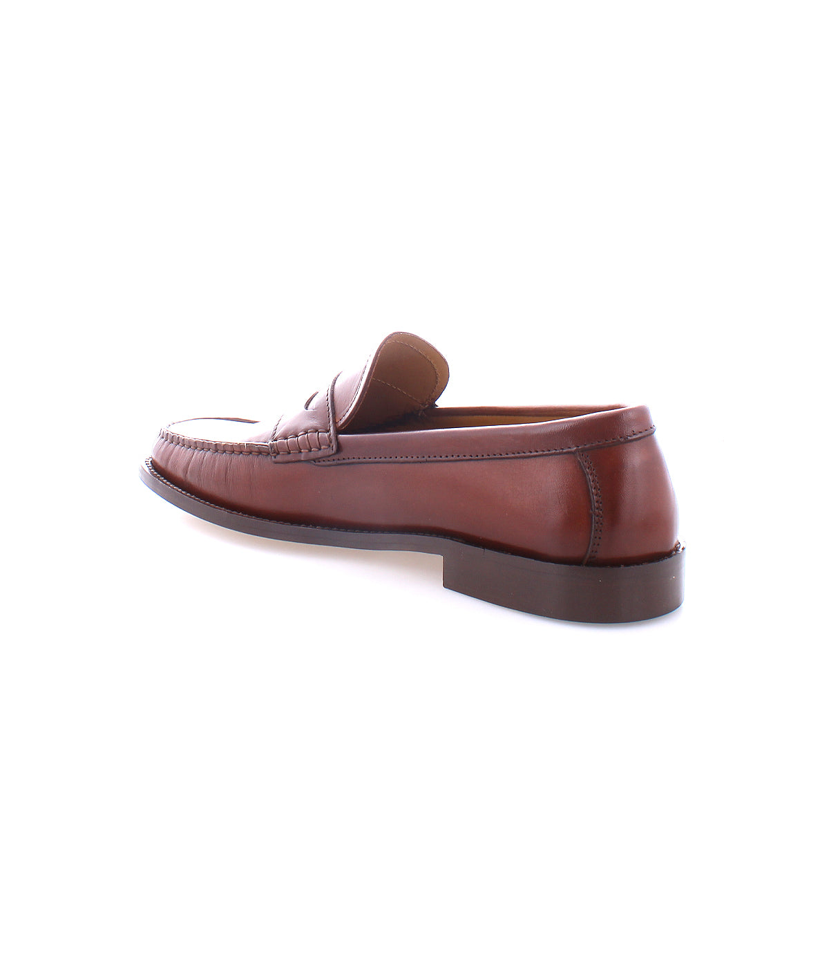 A single Moat loafer made from high quality leather, with a low heel, viewed from the rear side against a white background. Handcrafted in Italy by Bed Stu.
