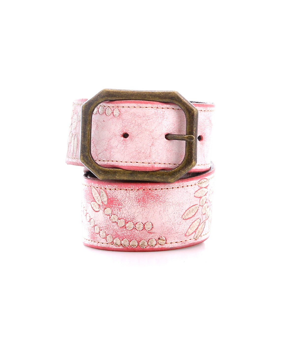 The Mohawk by Bed Stu is a women's pink leather belt with a vintage brass buckle featuring embossed floral and dotted patterns. Its design perfectly complements embroidered details for an elegant touch, and it coils neatly.