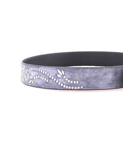 Bed Stu's Mohawk belt for women features distressed gray leather with white floral embroidery and a silver buckle, all presented on a pristine white background.