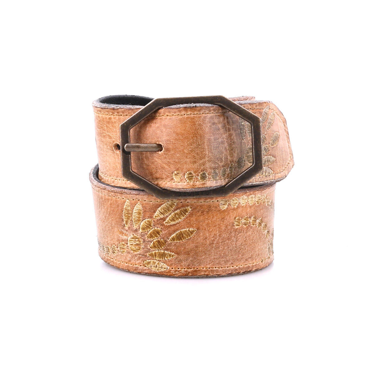 The Bed Stu Mohawk women's belt is crafted from brown distressed leather with floral embroidery and a bold geometric metal buckle, shown rolled up on a white background.