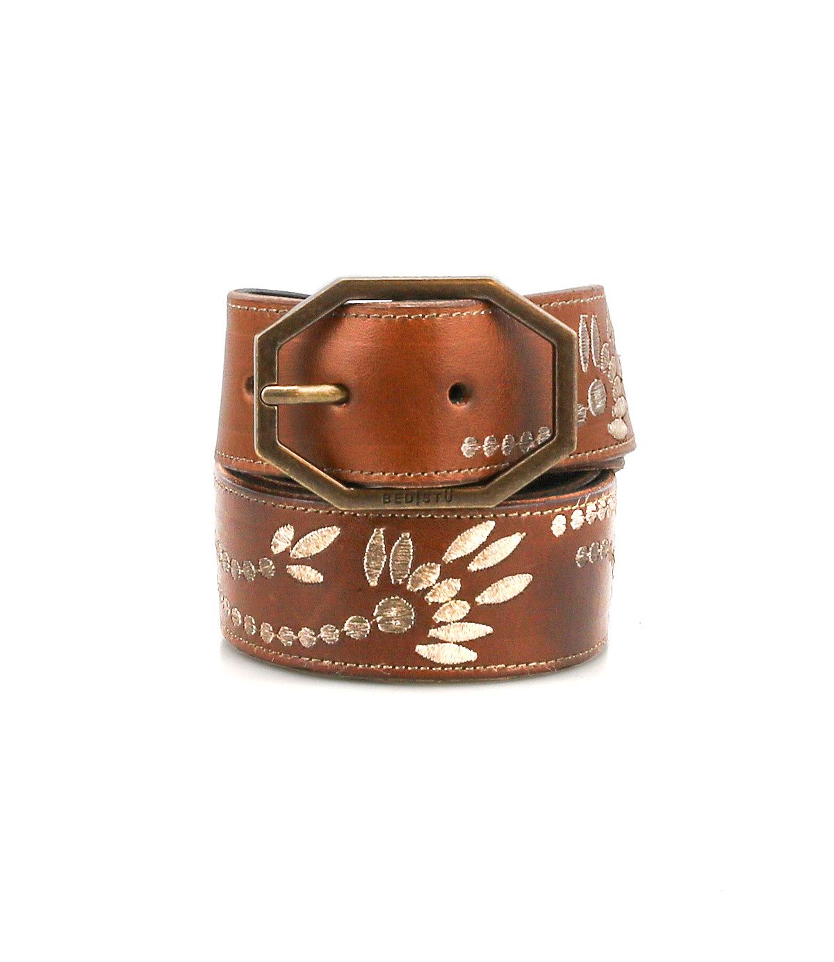 The Bed Stu Mohawk is a distressed brown leather belt with a gold embroidered leaf and dot pattern and a large octagonal brass buckle, shown against a white background.