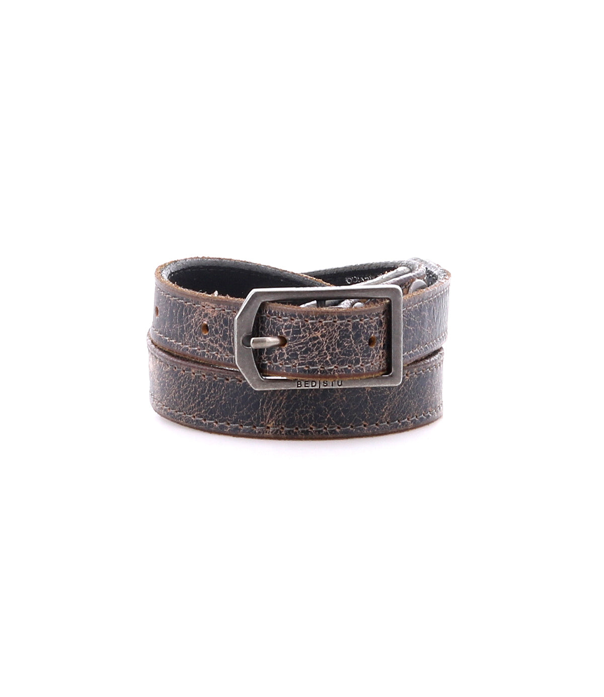 The Bed Stu Monae is a brown distressed leather skinny belt with a silver rectangular buckle, shown rolled up on a white background.