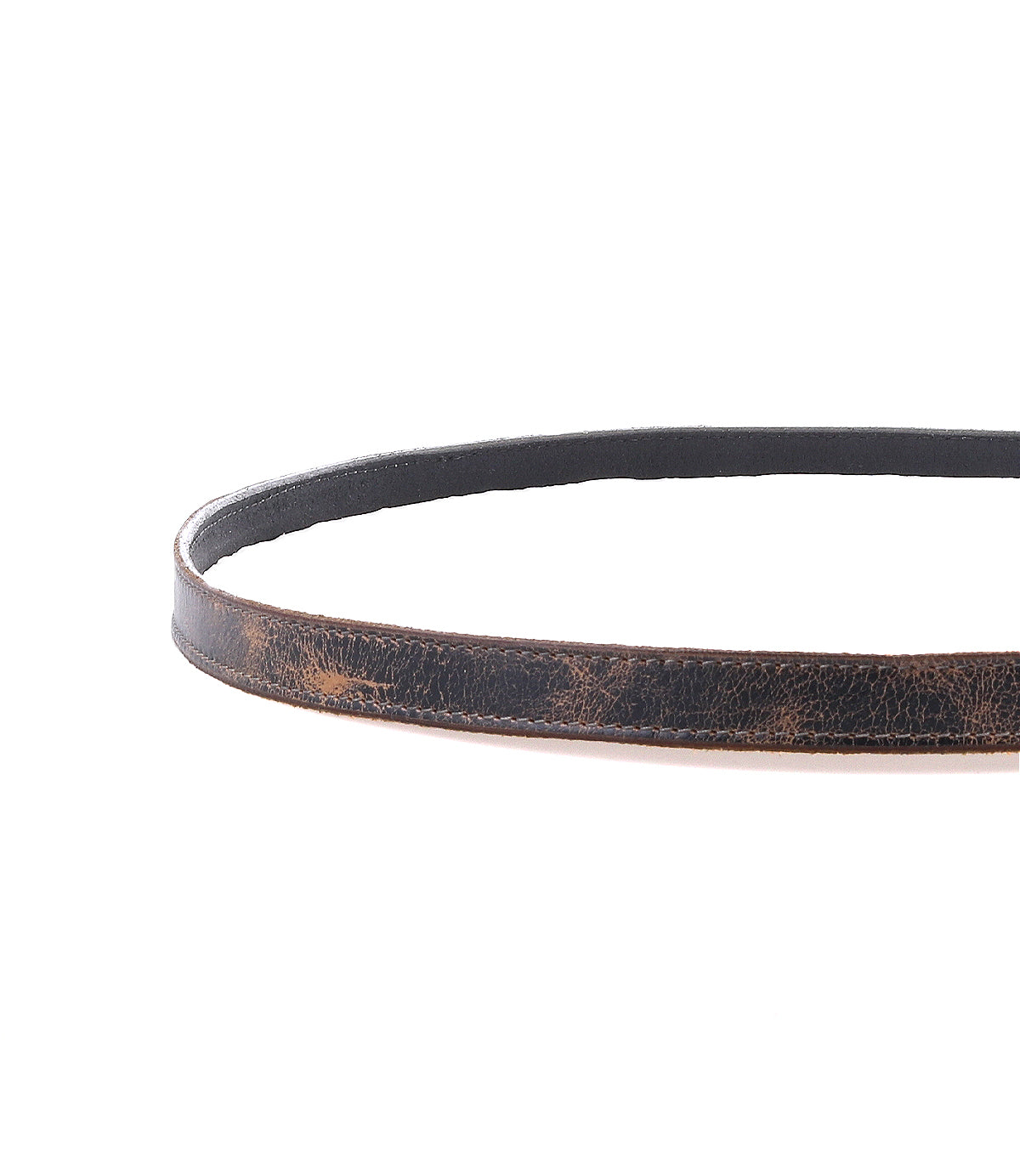 The Bed Stu Monae is a brown leather skinny belt with vintage creases, styled in a circular shape on a white background—a timeless women’s fashion accent.