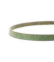 A close-up of the Monae green leather belt by Bed Stu, ideal for a boho-inspired look, displayed against a white background.