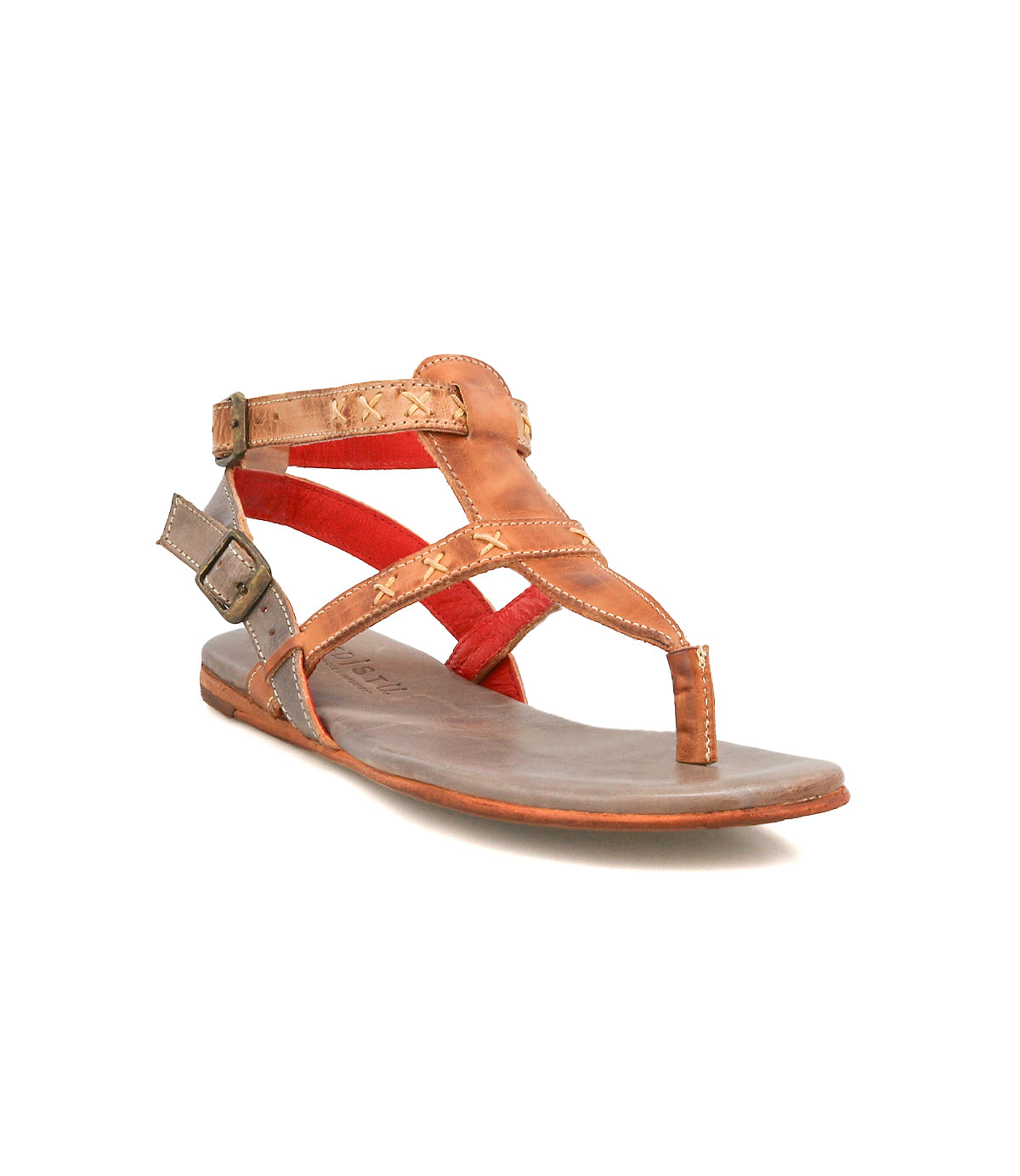 The Bed Stu Moon is a brown leather sandal with two buckled straps and red accents, featuring an open toe, flat sole, and cushioned insole for all-day comfort.