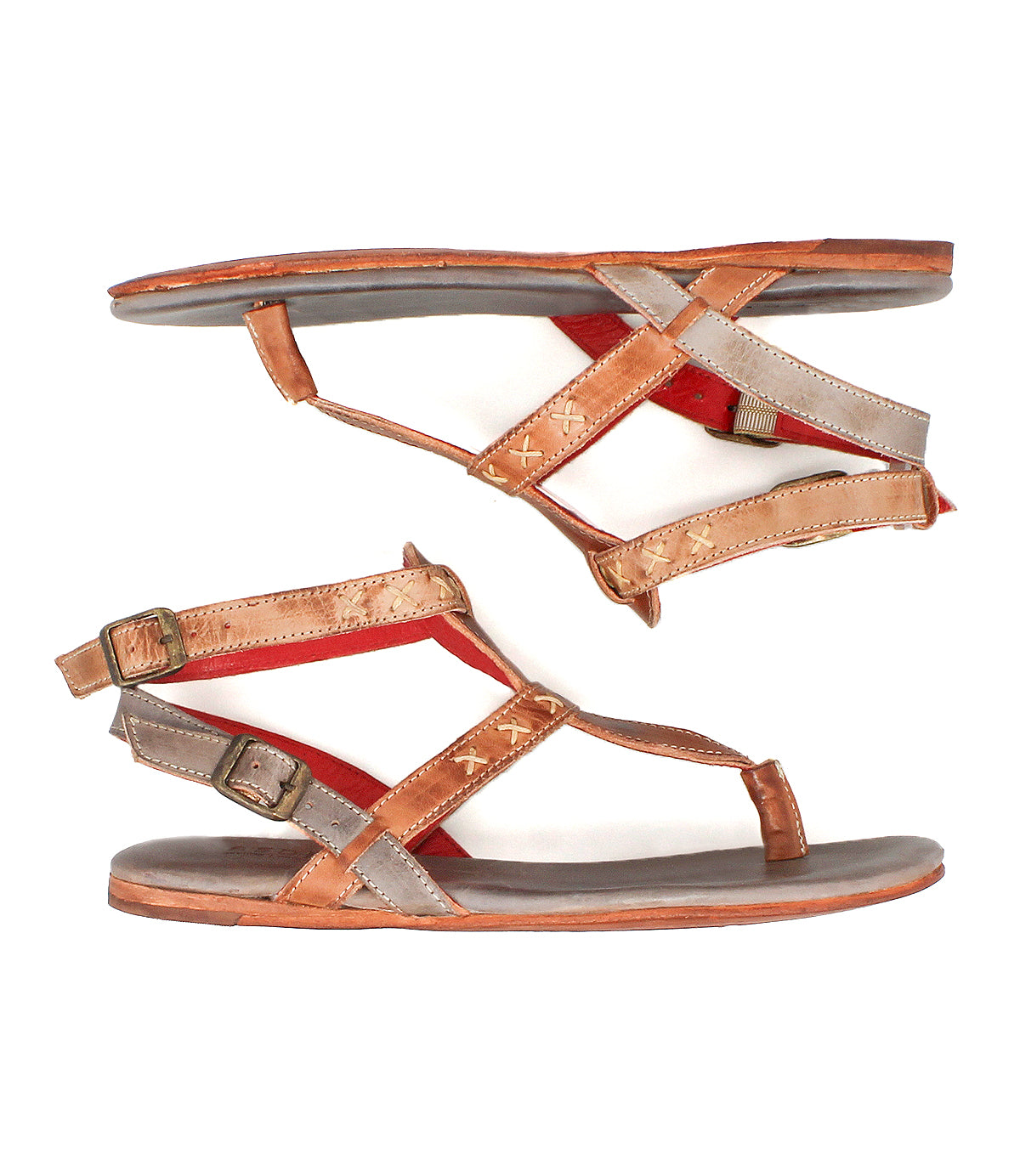 The Bed Stu Moon sandals feature flat leather soles, brown, gray, and red straps, a cushioned insole, and ankle buckle closures. Shown from the side on a white background.
