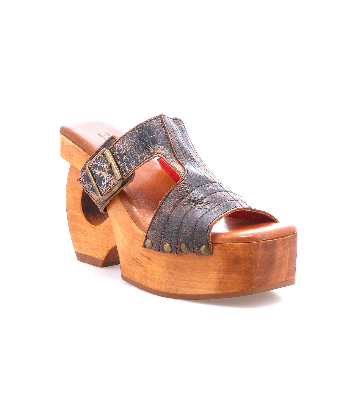 The Bed Stu Mutable is a single wooden platform clog sandal featuring a dark leather upper, decorative buckle, and stud accents with vintage flair, shown against a white background.