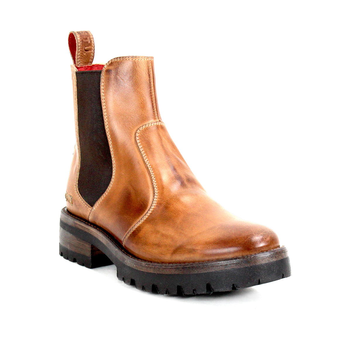 Nandi III by Bed|Stü—a brown leather Chelsea boot featuring dual side gores, black elastic panels, a red pull tab, and a thick black treaded sole—timelessly displayed on a white background.