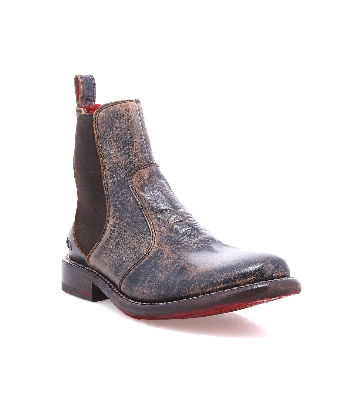 Bed|Stü Nandi distressed leather Chelsea boot featuring side elastic panels and a distinctive red sole for versatile slip-on wear.