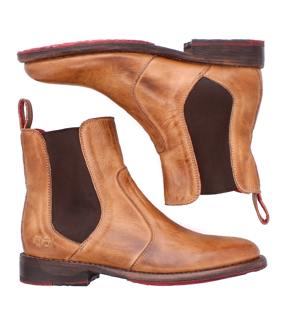 The Bed|Stü Nandi is a brown leather Chelsea boot with dark elastic panels, red soles, pull tabs, shown from side and bottom views.