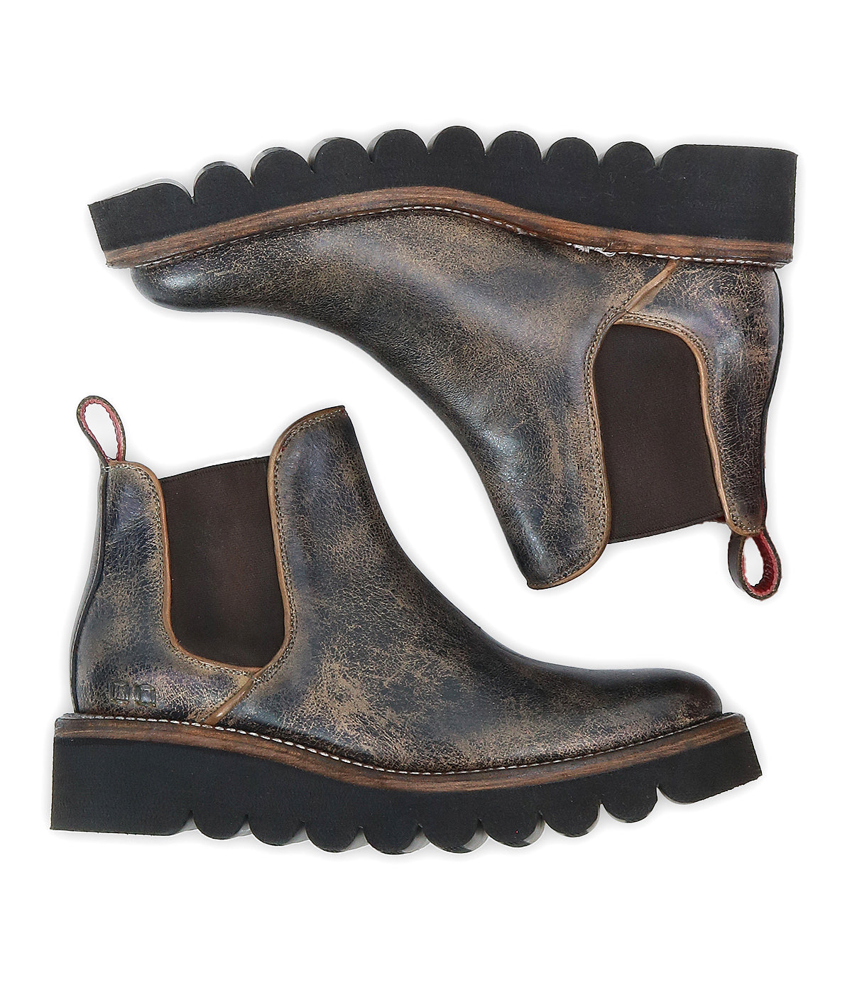 The Bed Stu Novel II is a pair of distressed brown leather Chelsea boots with elastic side panels, pull tabs, and a lightweight sole with thick black scalloped edges, shown side by side.