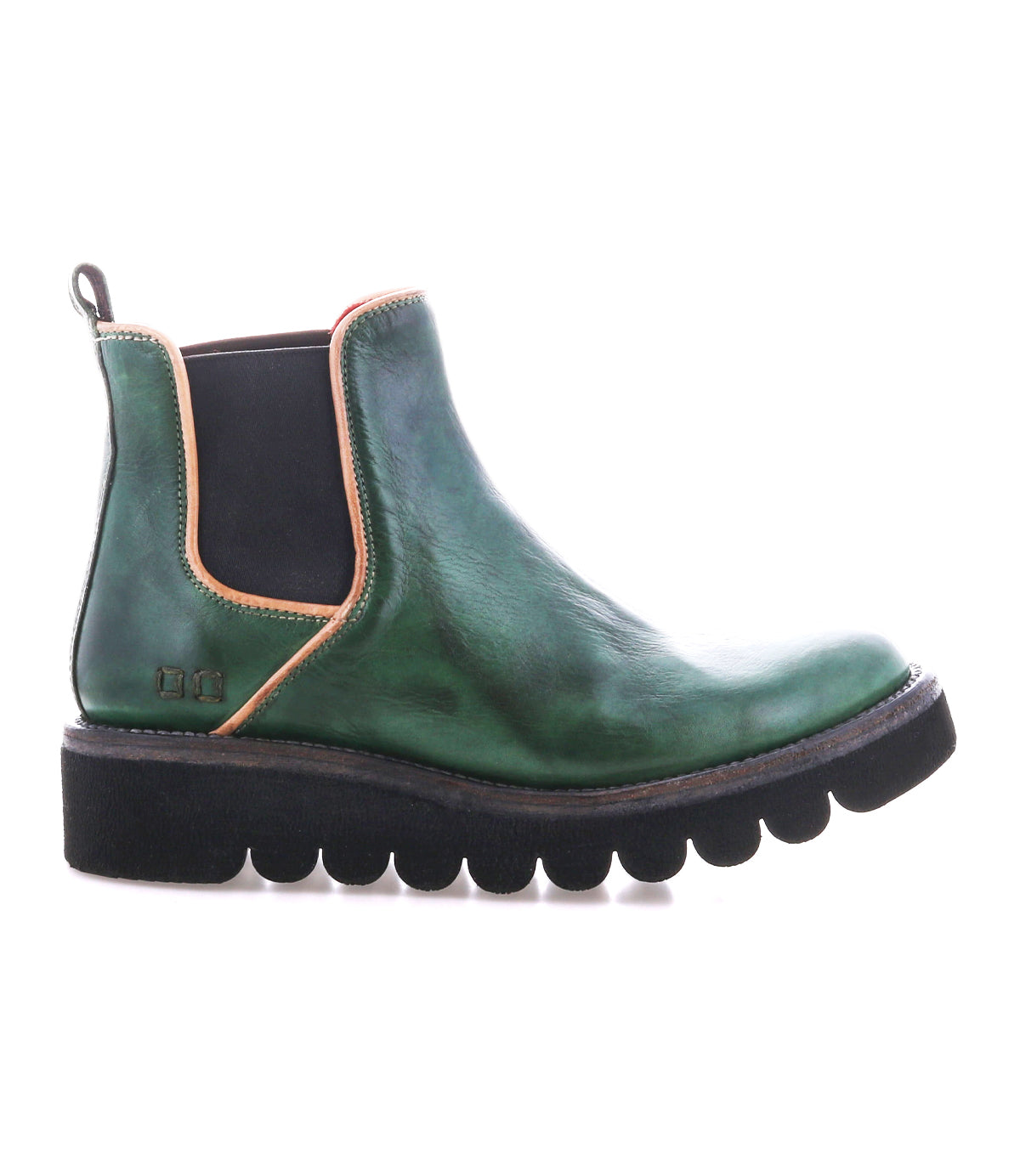 The Bed Stu Novel II is shown in side profile: a green leather Chelsea boot with black elastic side panels, tan trim, pull tab, and a thick black ridged lightweight sole on a white background.