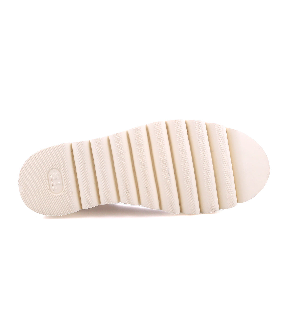 The image shows the bottom view of Bed Stu’s Novel II, a white Chelsea boot featuring a lightweight sole with six wide, evenly spaced horizontal grooves.