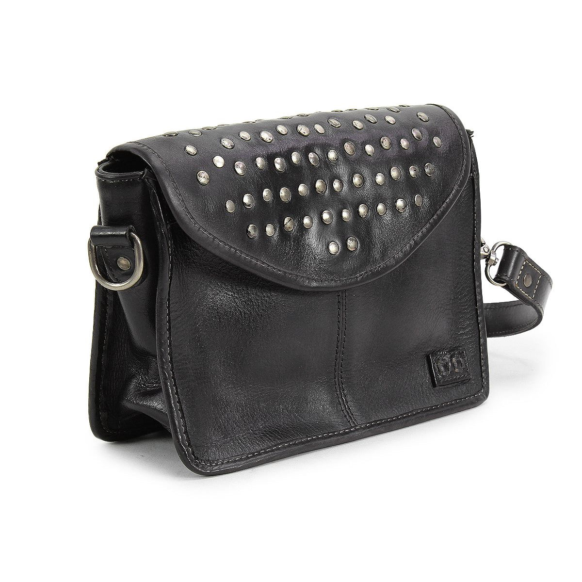 The Occurrence by Bed Stu is a black leather handbag adorned with silver studs on the flap and features a detachable shoulder strap, catering to those looking for an edgy design. This versatile bag effortlessly transforms into a chic crossbody suitable for any occasion.