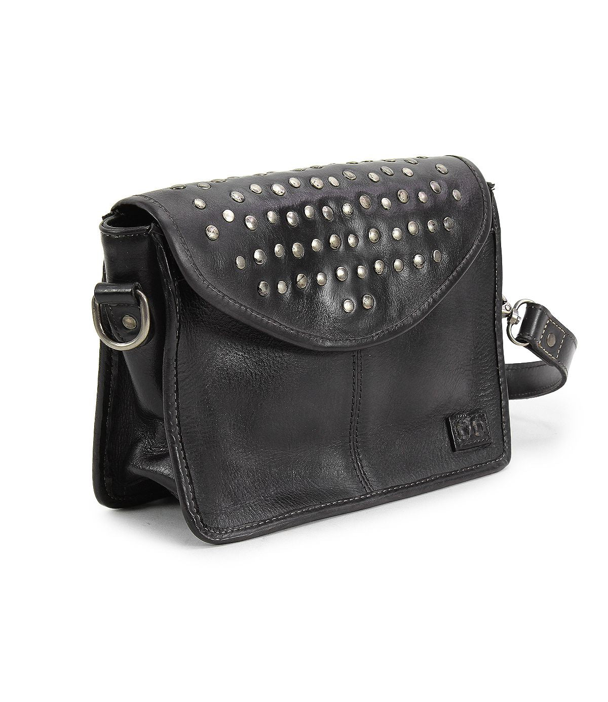 The Occurrence by Bed Stu is a black leather handbag adorned with silver studs on the flap and features a detachable shoulder strap, catering to those looking for an edgy design. This versatile bag effortlessly transforms into a chic crossbody suitable for any occasion.