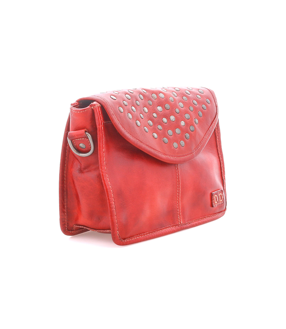 The Bed Stu Occurrence is a red leather compact crossbody featuring a flap adorned with metal studs and a small embossed logo on the lower right corner.