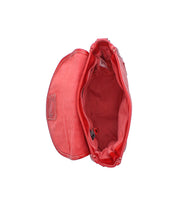 Top view of the Bed Stu Occurrence compact red suede crossbody handbag with a flap cover, showing an empty main compartment and fabric lining.