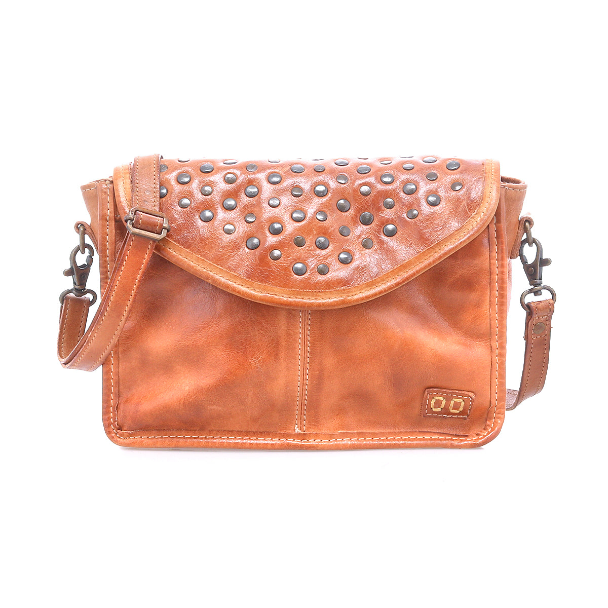 The Bed Stu Occurrence is a brown leather compact crossbody bag with a flap closure, metal studs, and a detachable strap—perfect as a stylish grab-and-go accessory for any occasion.