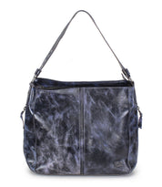 The Bed Stu Packet LTC II is a large black leather shoulder tote with a single strap, zippered top, textured finish, and small metal logo—ideal for everyday use or travel.