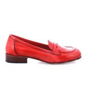 A red Italian leather loafer with a small heel and classic penny slot detail on the upper, Paris by Bed Stu.