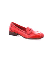 A single red Italian leather Paris by Bed Stu with a low heel and stitching details on a white background, showcasing its classic style.