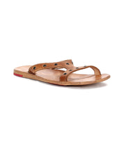 The Path sandal by Bed Stu features a brown leather upper, flat wooden sole, open toe design, and stylish metal grommet accents.