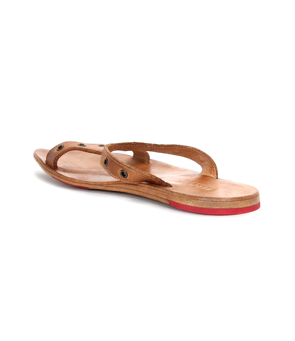 The Path sandal by Bed Stu is a brown leather flat with red detail on the bottom, a thong strap, stylish metal grommets, and durable Vibram rubber plates for added comfort and grip.