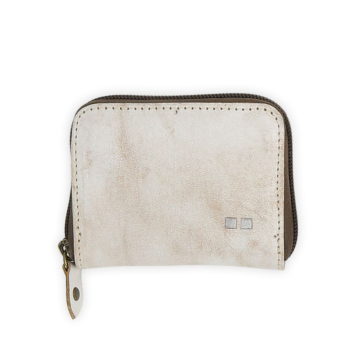 The Peek by Bed Stu is a compact beige zippered wallet made from premium leather with a subtle texture. It features a small double square logo in the bottom right corner and has convenient card slots inside.