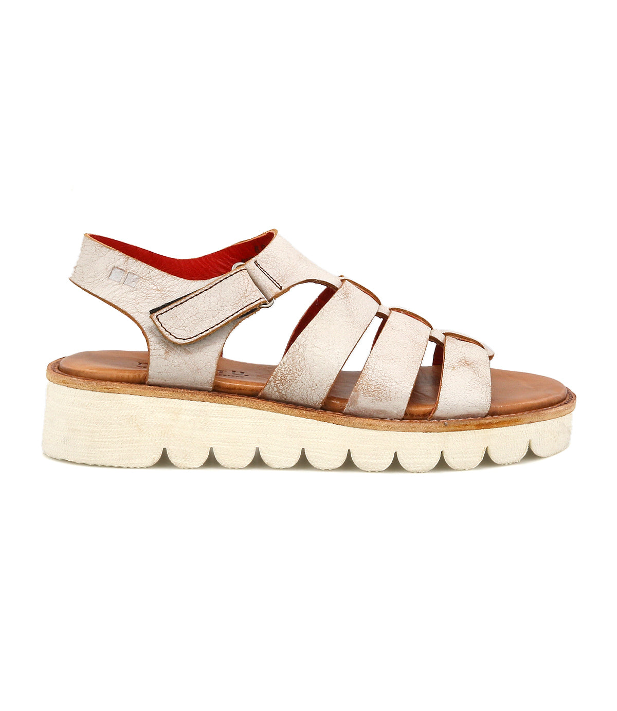 The Bed Stu "Perfect" sandal features beige leather, multiple straps, a thick textured platform sole, and a cushioned footbed, inspired by modern fisherman styles and shown in side profile.