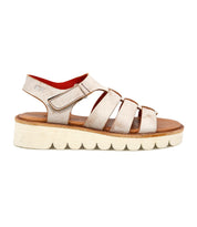 The Bed Stu "Perfect" sandal features beige leather, multiple straps, a thick textured platform sole, and a cushioned footbed, inspired by modern fisherman styles and shown in side profile.