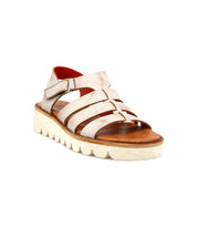 The Bed Stu Perfect sandal features beige straps, a velcro ankle closure, cushioned footbed, and thick textured white sole with a brown insole—combining modern fisherman-inspired style and all-day comfort.