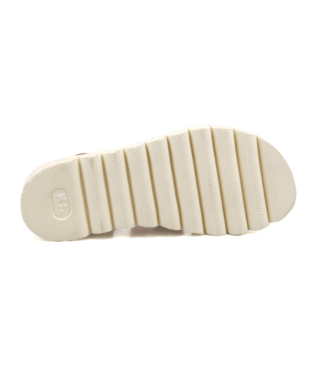 The Bed Stu Perfect sandal features a white sole with deep horizontal grooves and textured areas, seen from the bottom—crafted for cushioned footbed comfort in modern fisherman sandals.