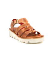 The Bed Stu Perfect sandal features brown leather, a platform with buckle strap, cushioned footbed, and white grooved sole, shown at a three-quarter angle on a plain white background.