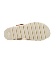 The image shows the bottom view of the Bed Stu Perfect fisherman sandal, featuring a white textured sole with grooves and a small oval logo near the heel.
