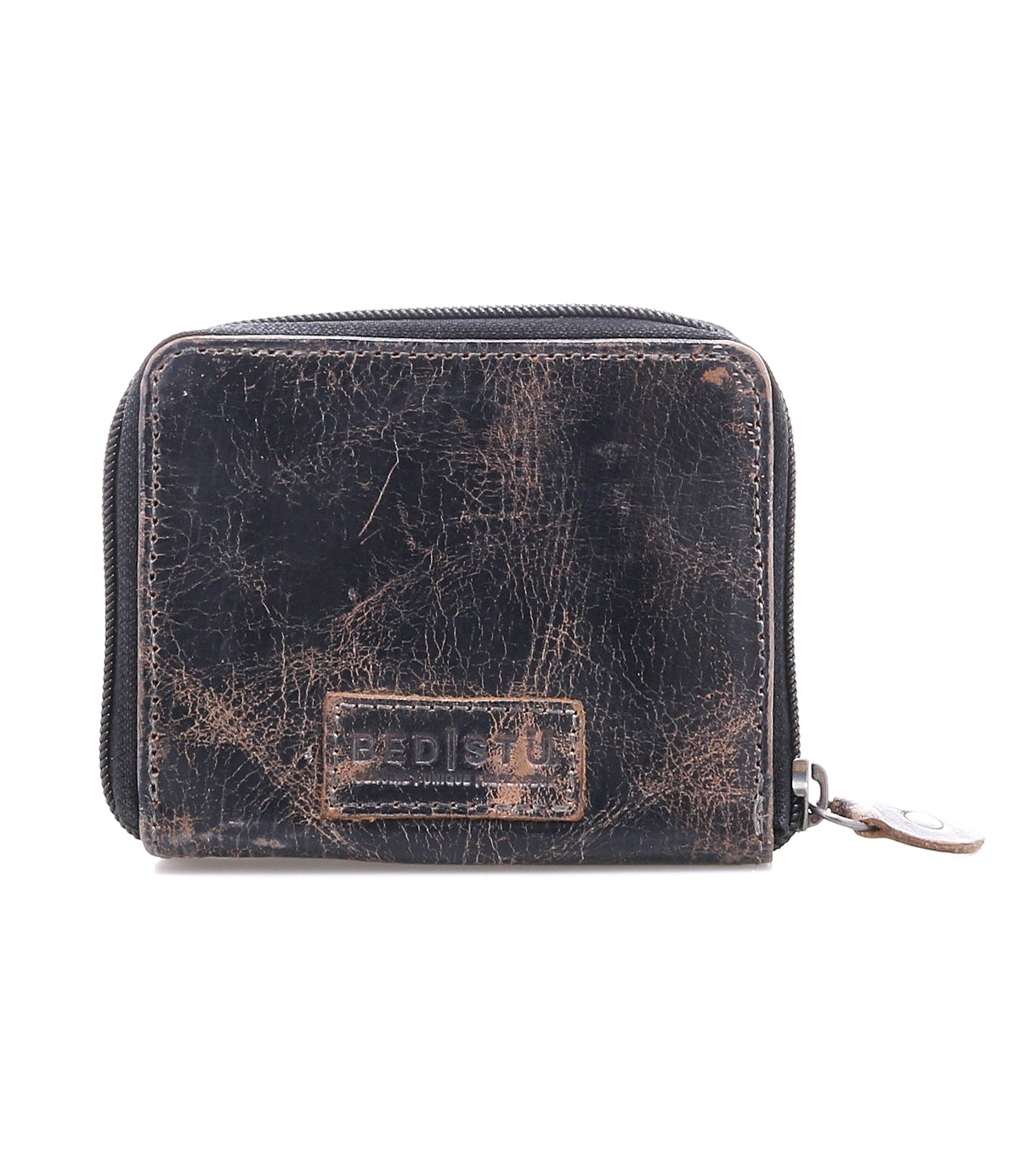 A worn black compact leather wallet by Bed Stu, called Plus, featuring visible creases, a front rectangular embossed patch, and a zippered coin pocket.