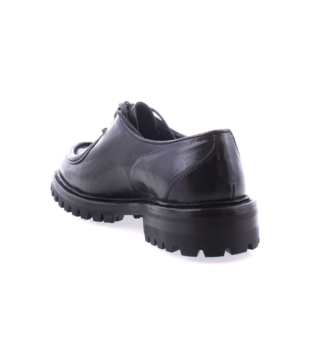 Portare by Bed Stu, a black leather shoe featuring a rugged, chunky Livetech outsole, viewed from the back on a white background.
