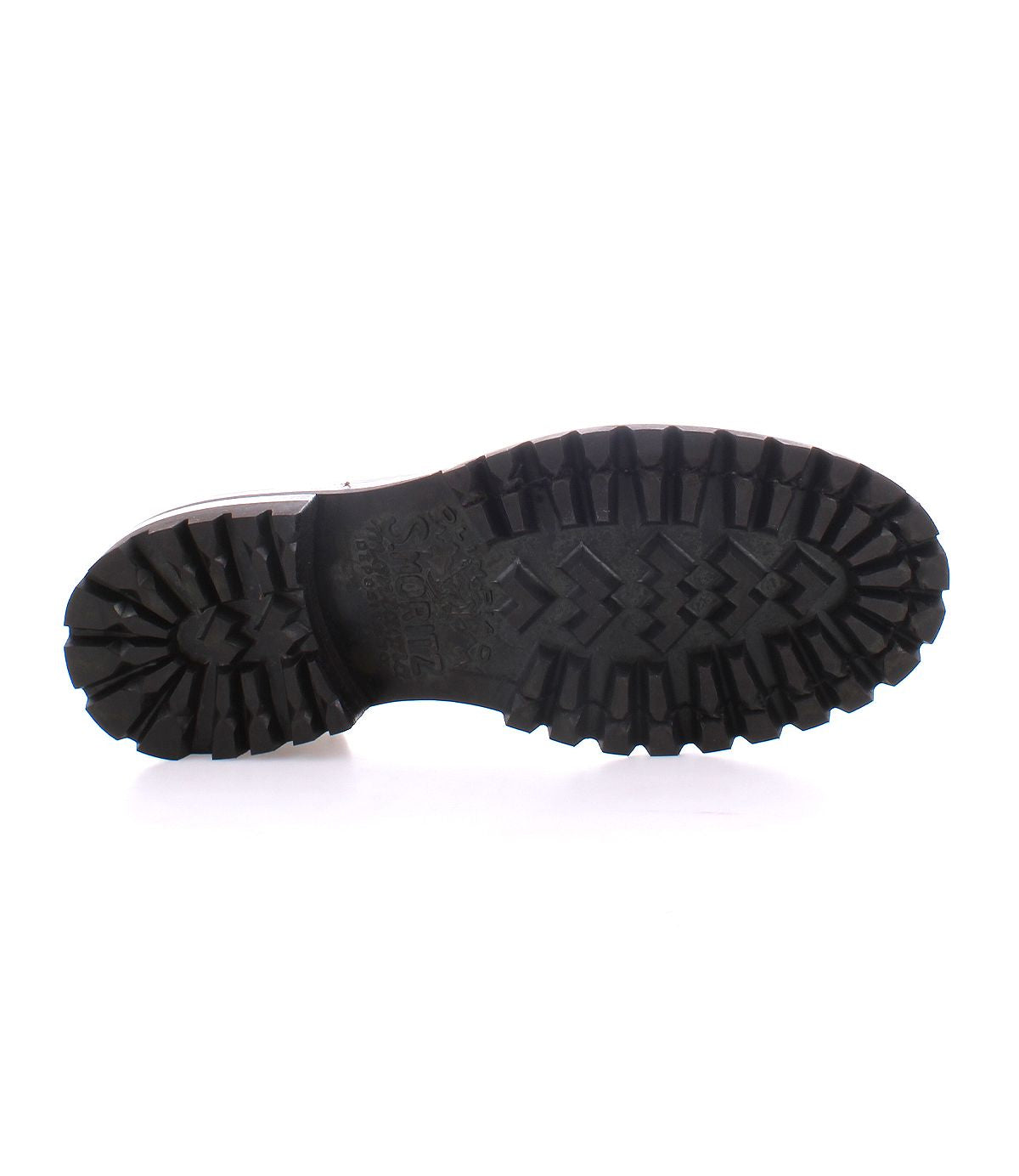 Image of the Portare boot sole by Bed Stu, featuring deep, rugged treads and vintage-inspired design elements against a white background.